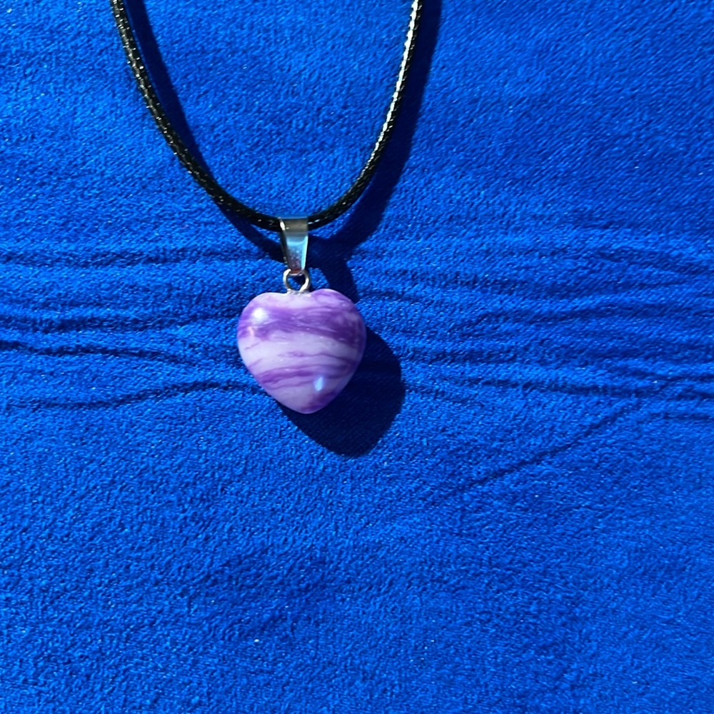Purple and white‎ hart pendant necklace.